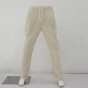 Pantalones de chándal beige para hombre con cordón ajustable y pliegues frontales