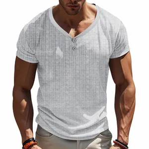 Close-up detail of men's Henley shirt showing breathable slub texture and V-neck