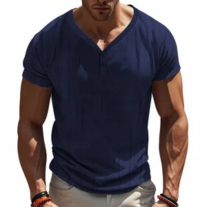 Detail of navy blue men's Henley shirt featuring faux linen slub texture and buttons