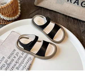 Detailed view of girls' minimalist open-toe sandals with soft soles for summer