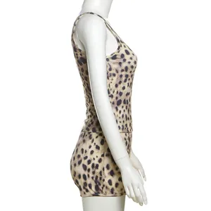 Side view of trendy leopard print slim-fit tank top and mini shorts set for women