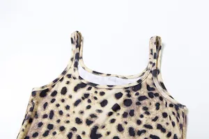 Detailed macro view of the ribbed fabric and leopard print on a women's camisole top