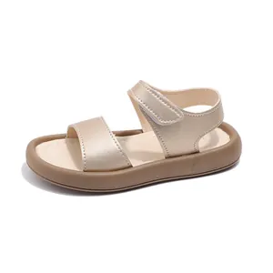 Stylish champagne gold girls' open-toe sandals with soft sole and adjustable velcro straps