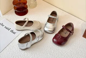 Stylish girls' Mary Jane shoes with braided straps in beige, silver, and burgundy colors.
