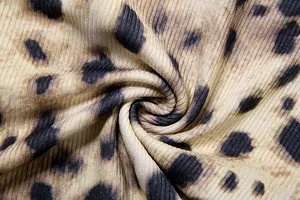 Macro detail of leopard print ribbed fabric showing soft texture and pattern quality