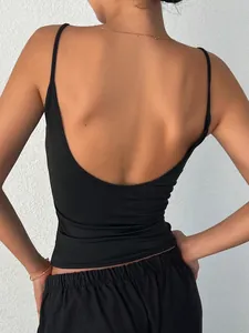 Close-up of black backless minimalist camisole tank top with slim fit design.