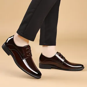 Elegant dark brown mens patent leather formal shoes featuring pointed toe and brogue details