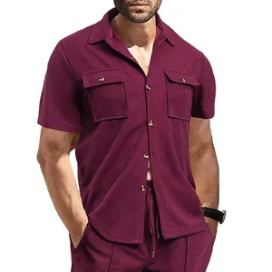 Close-up detail of a men's waffle knit short sleeve shirt with pockets in burgundy