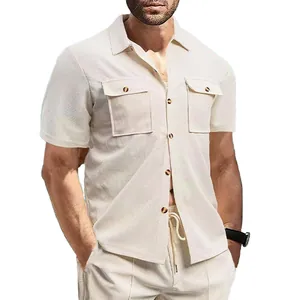 Detailed view of cream waffle knit short sleeve shirt with chest pockets for men