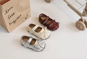 Elegant children's pleated Mary Jane princess shoes in silver, beige, and burgundy.