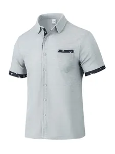 Men's grey waffle-knit short sleeve polo shirt with chest pocket and bird pattern trim.