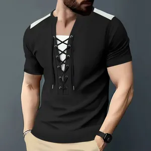 Close-up view of men's casual waffle knit short sleeve t-shirt with lace-up neck design