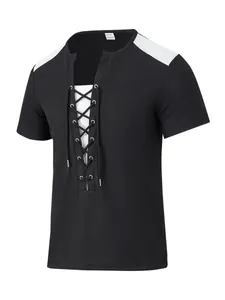 Close-up of black waffle knit T-shirt featuring contrast white panels and lace-up front