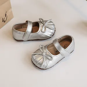 Silver pleated Mary Jane shoes for girls with elegant bow detail and soft comfortable sole