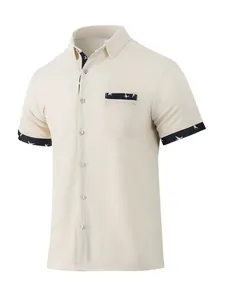 Close-up of men's casual shirt featuring waffle texture and patterned trim details.