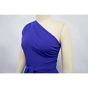 Close-up of royal blue one-shoulder sleeveless dress featuring elegant waist ruching.