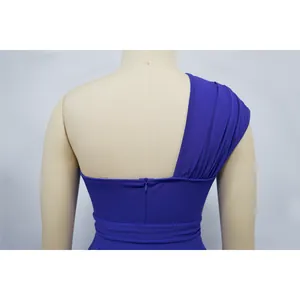 Detailed back view of royal blue one-shoulder dress showing hidden zipper and pleats