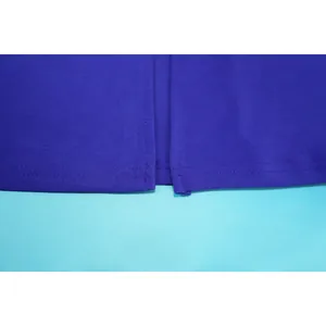 Detailed view of high-quality hem stitching on a solid royal blue sleeveless swing dress