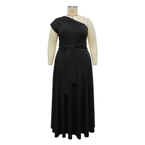 Detailed front view of a plus-size black one-shoulder maxi dress with a waist tie accent