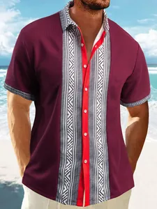 Close-up of men's burgundy waffle knit shirt with tribal geometric print panel.