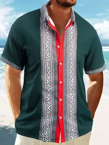 Close-up of men's dark green waffle knit shirt with ethnic print and red placket