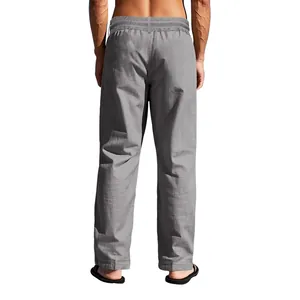 High quality back view of men's loose breathable grey linen pants in casual style