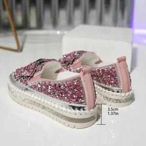 Close-up detail of pink rhinestone platform loafers showing 3.5cm / 1.37in heel height