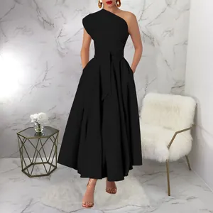 Elegant black one-shoulder sleeveless maxi dress with waist belt and pleated swing skirt.