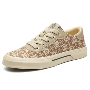 Baskets basses en toile pour hommes avec imprimé floral marron et semelle plate crème