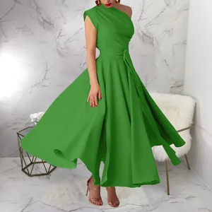 Elegant one-shoulder sleeveless green flared maxi dress with a stylish waist-tie detail