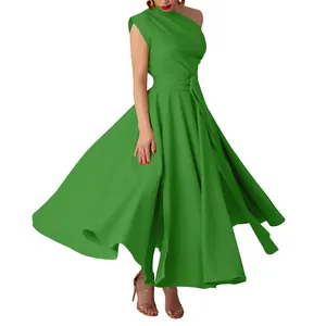 Detail view of a bright green one-shoulder sleeveless maxi dress with flared skirt