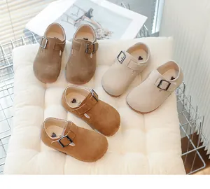 Detailed view of children's retro suede Birkenstock-style loafers in multiple colors