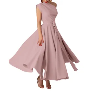 Detailed view of pink sleeveless one-shoulder dress with elegant pleated flared skirt