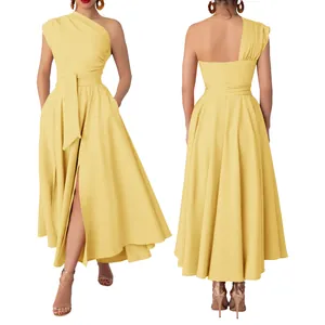Detail view of a yellow one-shoulder sleeveless maxi dress with a high slit and waist tie.