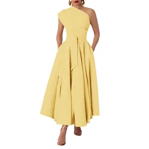 Elegant yellow one-shoulder sleeveless dress with belted waist and large swing skirt.