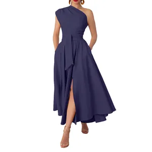 Detail view of navy blue one-shoulder maxi dress with waist tie and side slit design