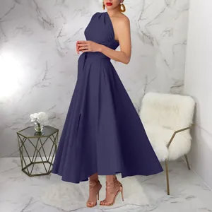 Detailed view of an elegant navy blue one-shoulder maxi dress with a belted waist
