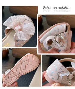 Detailed view of girls' pink princess sandals showing the bow and flexible sole.