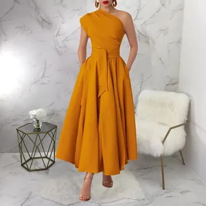 Elegant mustard yellow one-shoulder sleeveless maxi dress with belted waist detail