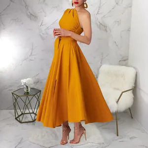 Detail of a bright yellow one-shoulder sleeveless maxi dress with a belted waist