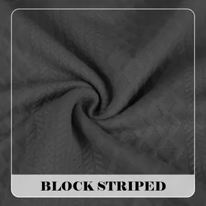 Texture détaillée du tissu en maille jacquard à rayures noires pour sweat-shirt homme