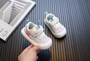 Detailed view of lightweight baby walking shoes with breathable mesh and soft soles