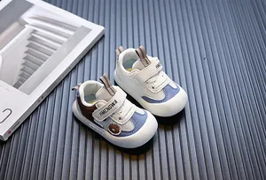 Detailed view of breathable baby walking shoes with secure velcro strap closure