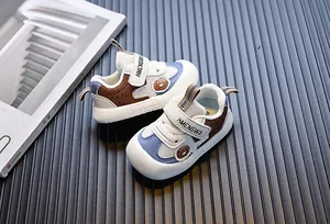 Detailed view of breathable mesh baby walking shoes with soft soles and velcro