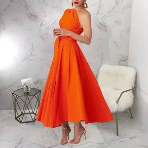 Elegant vibrant orange one-shoulder maxi dress with waist tie and high side slit