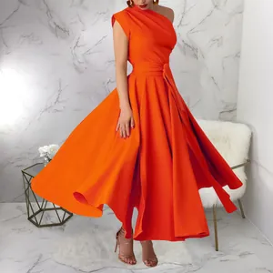 Detail view of vibrant orange one-shoulder sleeveless midi dress with belted waist