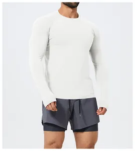 Close-up of men's white slim-fit long sleeve sports t-shirt for fitness and running.
