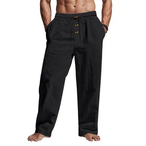 Dettaglio frontale dei pantaloni casual in lino nero da uomo con bottoni e coulisse regolabile