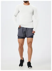 Men's slim fit white seamless long sleeve sports top and grey running shorts outfit