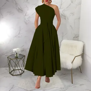 Detail of an olive green one-shoulder sleeveless dress with a belted flared skirt